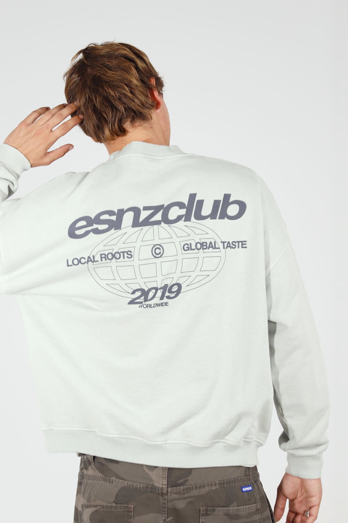 Dove Native Crewneck — back, on model