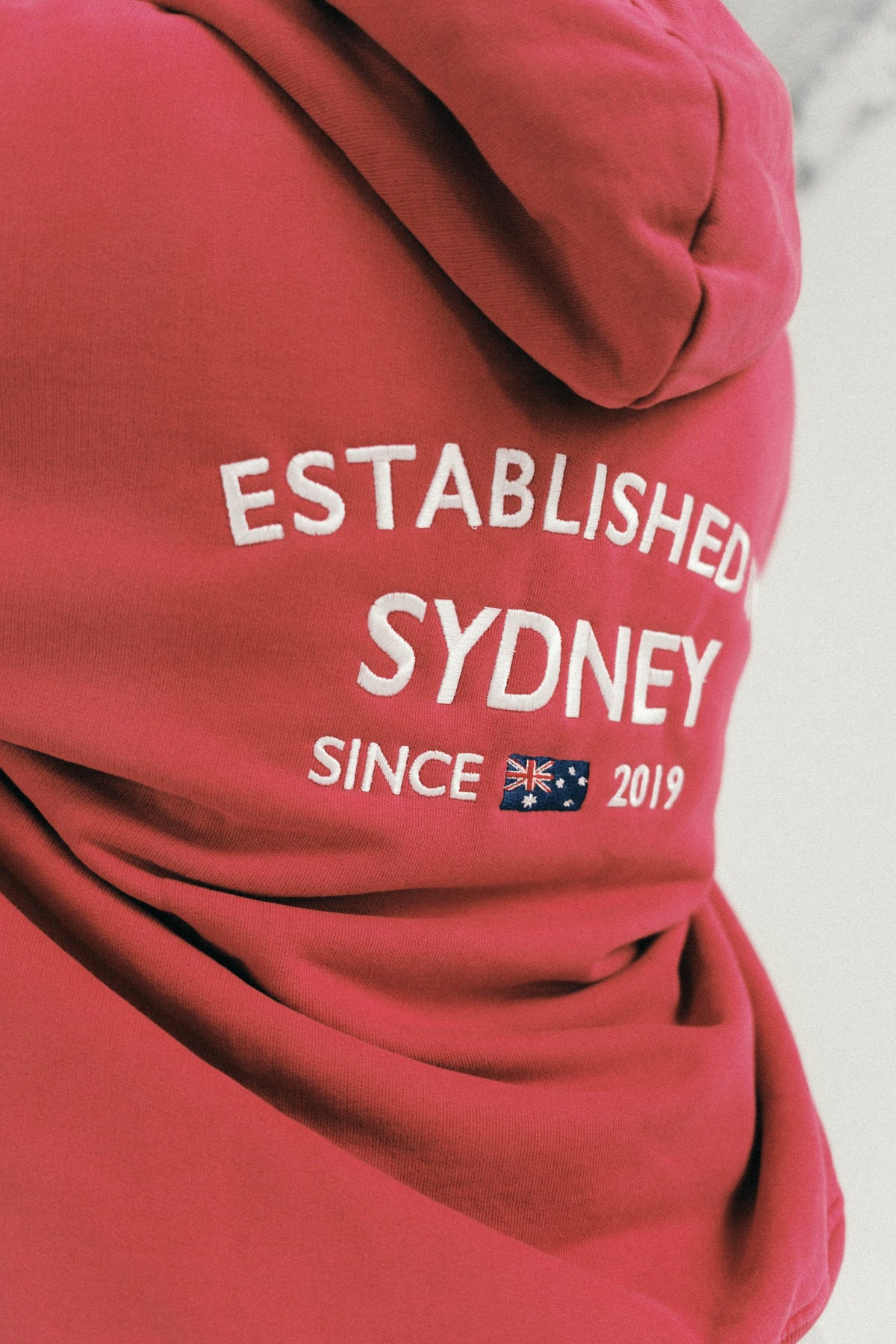 Esenzia Worldwide · bordado Sydney
